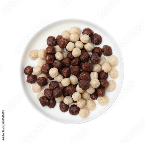 Breakfast cereal. Tasty corn balls with milk in bowl isolated on white, top view
