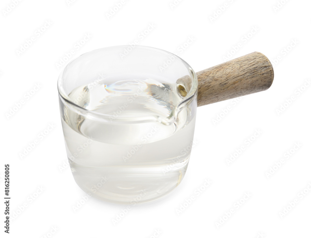 Vinegar in glass saucepan isolated on white Vinegar in glass saucepan isolated on white