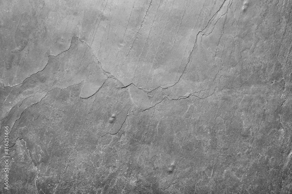 Naklejka premium Grey concrete textured surface as background, closeup