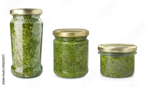 Pesto sauce in jars isolated on white, set