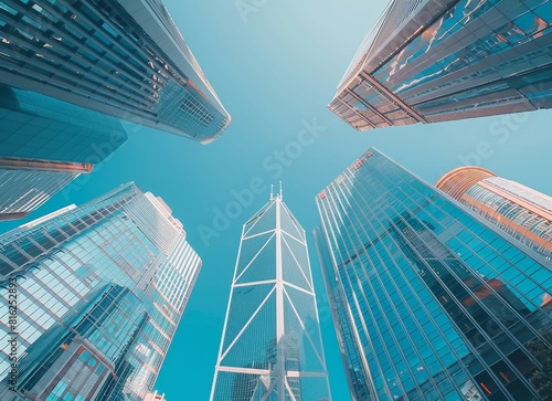 Stunning shot of modern skyscrapers against the blue sky  low angle perspective  stock photo  high resolution photography.