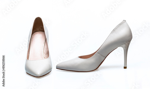 Beauty and fashion concept. Fashionable women shoes isolated on white background. Pair of white high heeled shoes. White high heel women shoes on white background. White shoe for women