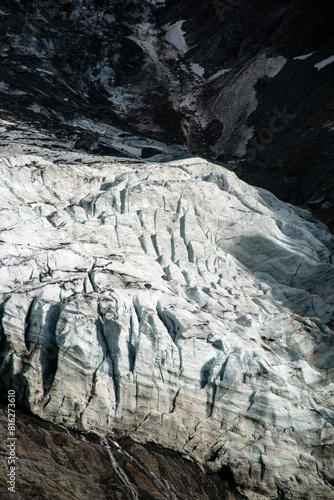 Les Bossons glacier and mountains in the Chamonix Valley in a cloudy day near montblanc, French Alps.