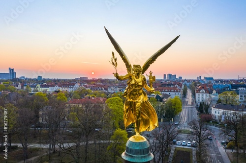 Golden Angel of Peace at sunrise, Peace Memorial, View of Prinzregentenstrasse and Bogenhausen, Drone shot, Munich, Upper Bavaria, Bavaria, Germany, Europe photo