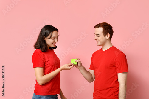 Young couple with condom on...