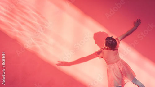 Childhood and dream about big and famous future Conceptual image with girl and drawned shadow of female figure skater on coral pink background Childhood dreams imagination education co : Generative AI photo