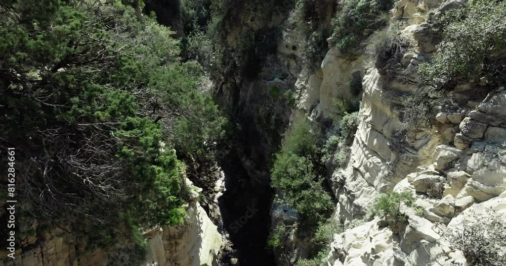 Spectacular Aerial View of Avakas Gorge in Cyprus, Revealing the Stunning Beauty of Mountainous Scenery, Rock Formations, and meandering River, Perfect for Hiking and Adventure Seekers. Spectacular Aerial View of Avakas Gorge in Cyprus, Revealing the Stunning Beauty of Mountainous Scenery, Rock Formations, and meandering River, Perfect for Hiking and Adventure Seekers.