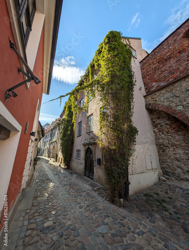 Old medieval narrow street in old town of Riga city, Latvia.