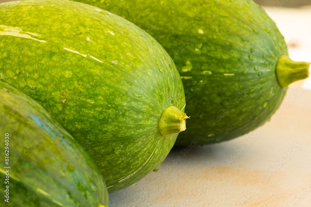 Photograph of fresh green pumpkins. Photograph of fresh green pumpkins.