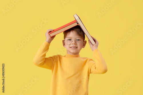 Cute little boy in eyeglass...