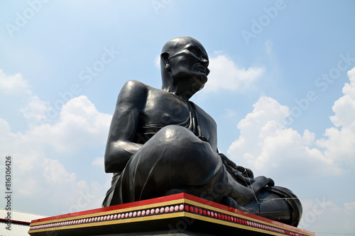 BANGKOK, THAILAND - May 16, 2024: Reverend Grandfather Tuad (Luang Phor Thuad) at Wat Phraya Suren Temple for praying at the giant statue of the famous monk, Thailand.
