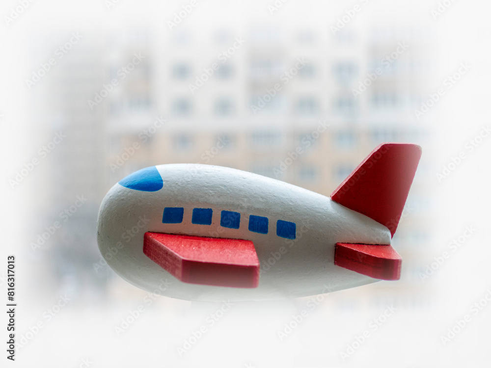 Wooden plane flies past the house Wooden plane flies past the house