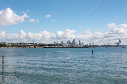 Sky Tower of Auckland city, skyline on a sunny day, New Zealand, may 2024,