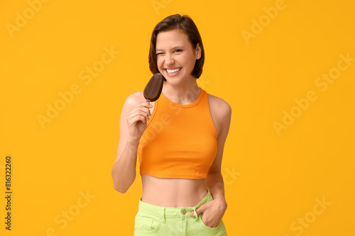 Happy young woman with choc...