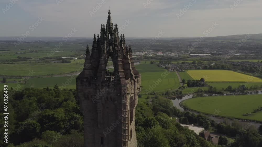 Aerial close view of National Wallace Monument Victorian Gothic architectural landmark and tourist attraction in Scotland, UK Aerial close view of National Wallace Monument Victorian Gothic architectural landmark and tourist attraction in Scotland, UK