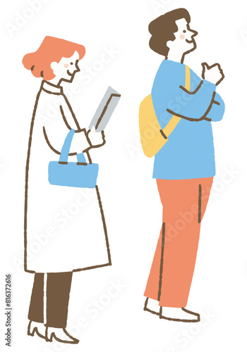 Middle-aged couple looking at a painting at an exhibition_Color