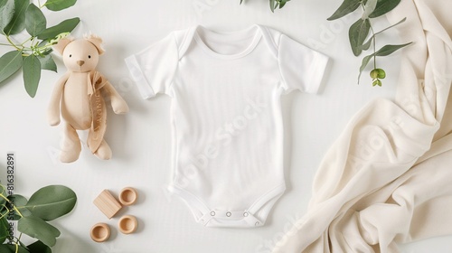 White baby bodysuit mockup on white background. Flat lay, top view.