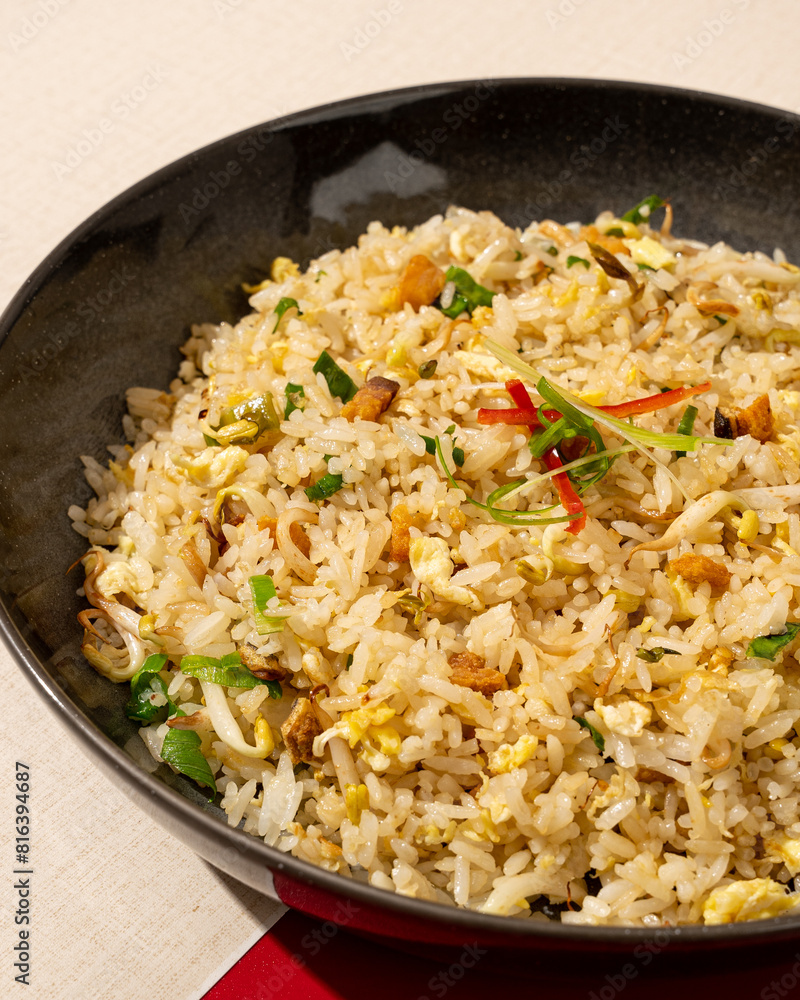 Salted fish fried rice is a dish of rice fried in a pan which produces a different taste because it is mixed with spices and salted fish. Salted fish fried rice is a dish of rice fried in a pan which produces a different taste because it is mixed with spices and salted fish.