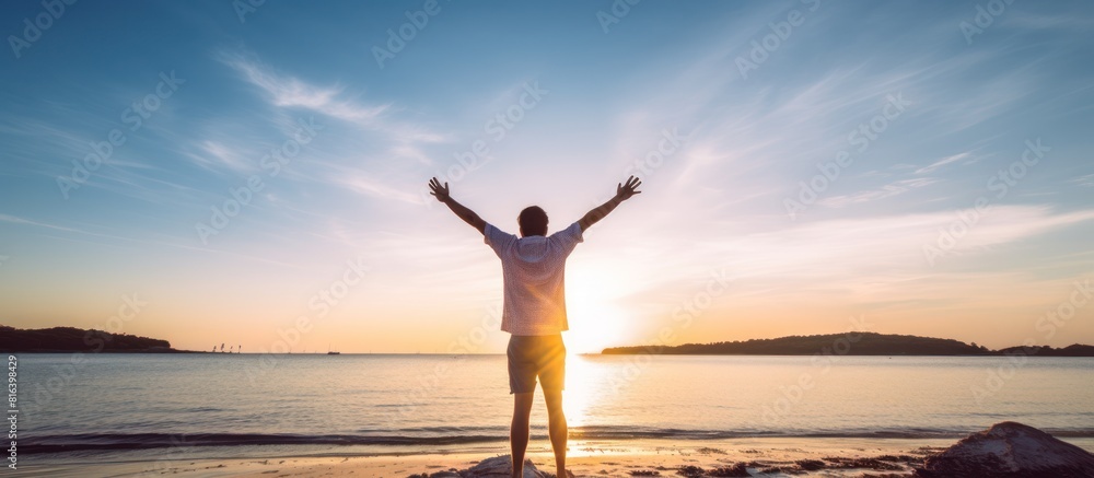a man with an expression of joy while on holiday at the beach a man with an expression of joy while on holiday at the beach