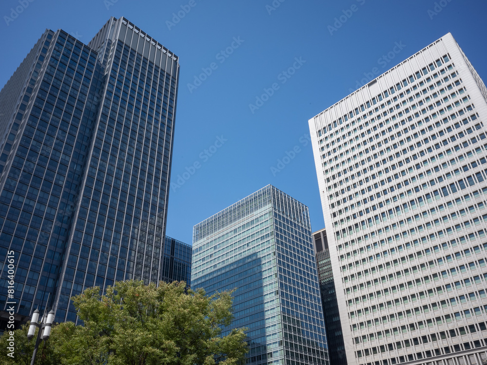 urban cityscape with tall office buildings in the center city of tokyo urban cityscape with tall office buildings in the center city of tokyo