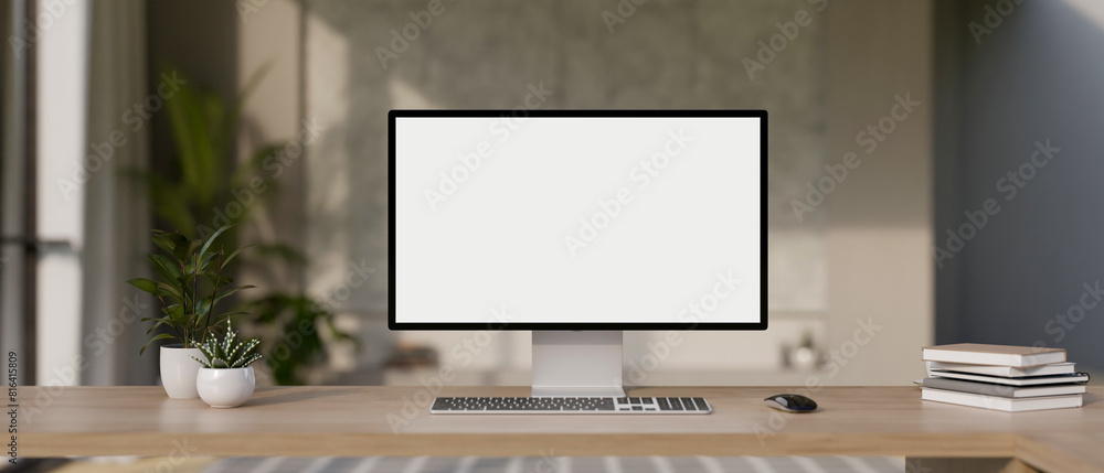 A desktop computer mockup and accessories on a wooden desk in a modern office room. A desktop computer mockup and accessories on a wooden desk in a modern office room.
