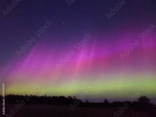 Wallpaper Mural Northern lights (Aurora borealis) in the sky over Tromso, Norway Torontodigital.ca