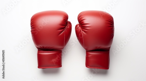 A pair of red boxing gloves on a white background. © admin_design