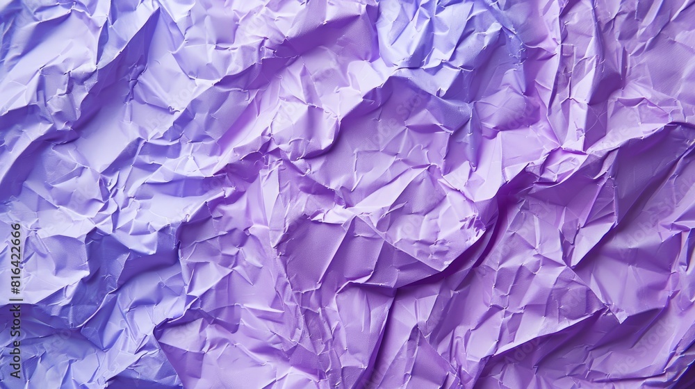Purple crumpled paper texture background from above