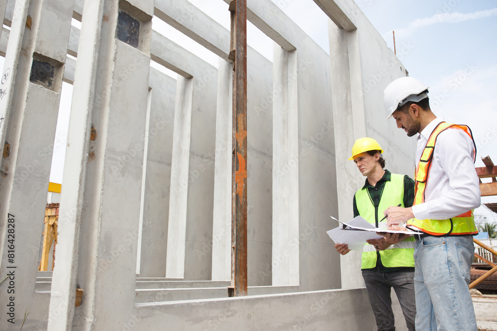 custom made wallpaper toronto digitalEngineer team discuss and examine a building construction.