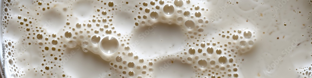 Abstract texture of whipped fresh milk, bubbles and milk rivers. Shampoo foam with bubbles. Confectionery or cosmetic banner Abstract texture of whipped fresh milk, bubbles and milk rivers. Shampoo foam with bubbles. Confectionery or cosmetic banner