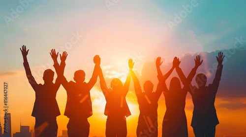 Silhouette of group happy business team making high hands over head in beautiful sunset sky evening time for business success and teamwork concept in company   Generative AI