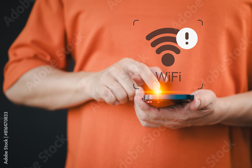 Man using mobile phone searching for wifi signal. But the mobile phone does not receive any signal. Technology communication concept of connected smartphone But no service.