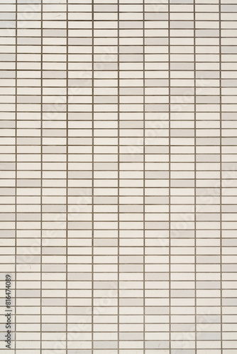 Gray tile wall. Abstract construction background.