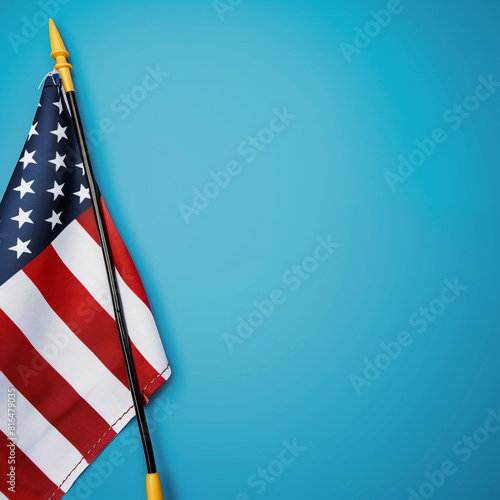 American flag stands out against a striking blue background  Memorial Day. photo