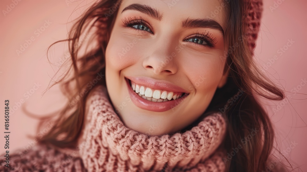 A tight shot of a joyful woman donning a knitted scarf and hat, hair billowing in the wind A tight shot of a joyful woman donning a knitted scarf and hat, hair billowing in the wind