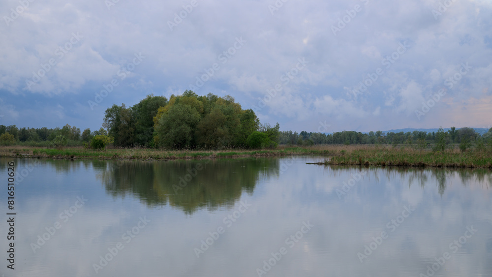 The river Inn near Kirchdorf on a cloudy evening The river Inn near Kirchdorf on a cloudy evening