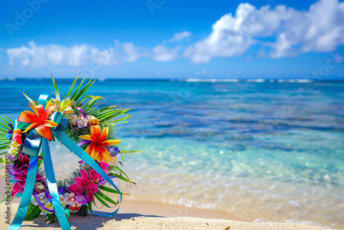 Island beach setting  a Memorial Day wreath with vibrant tropical ribbons. photo