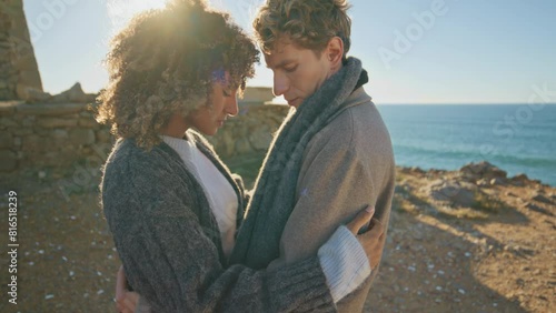 Closeup affectionate couple bonding posing camera on sea beach. Romantic date