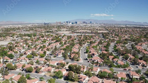 Aerial shot of Las Vegas suburb with strip city casino skyline in background 23