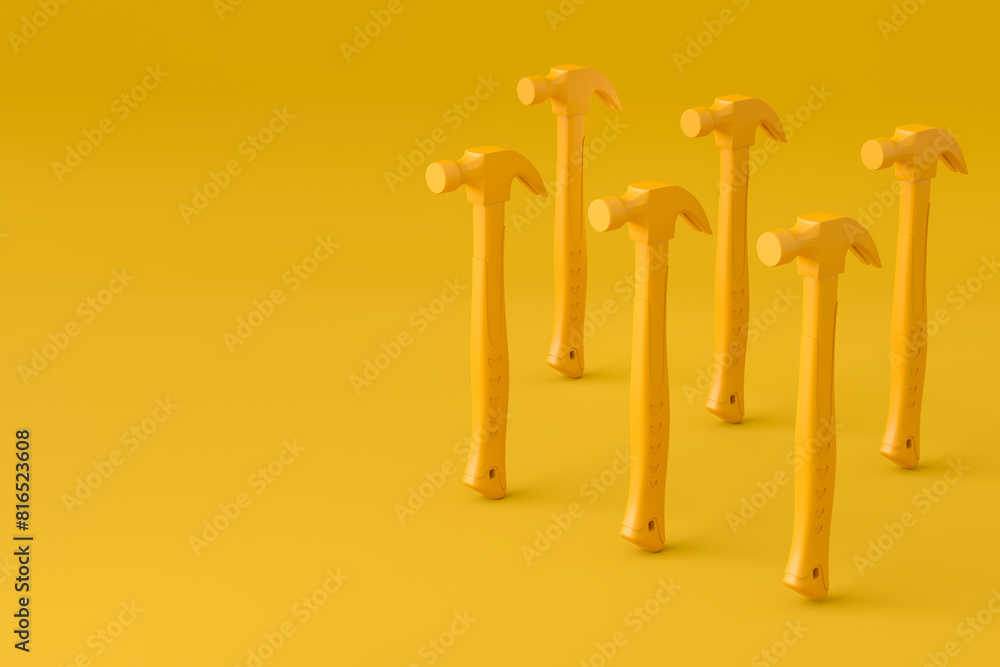 Set of hammers with a rubberized handle on monochrome background Set of hammers with a rubberized handle on monochrome background
