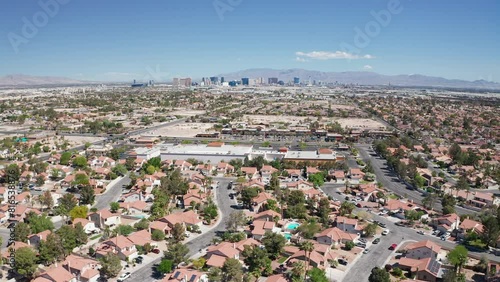 Aerial shot of Las Vegas suburb with strip city casino skyline in background 22