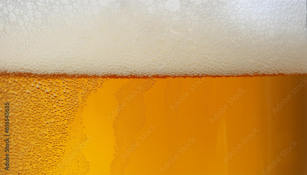 Closeup of beer with bubbles and foam in glass Closeup of beer with bubbles and foam in glass