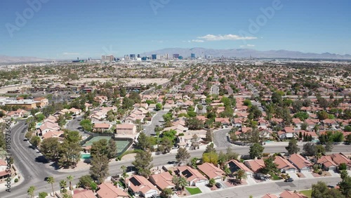 Aerial shot of Las Vegas suburb with strip city casino skyline in background 27