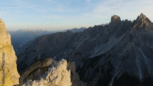Pan Right Reveals Incredible Cadini of Misurina Mountains in Italian Dolomites. Scenic Sunset in Italy photo