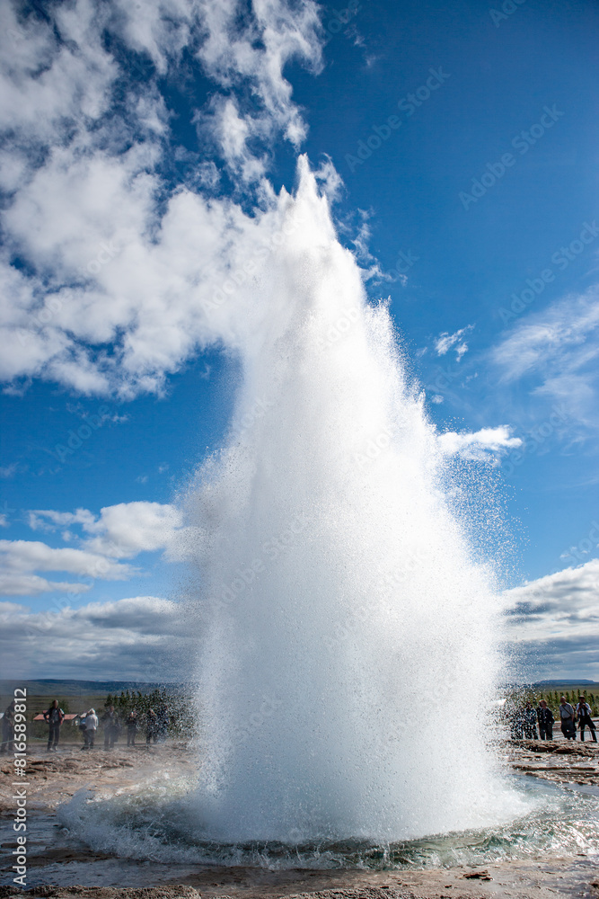 Geyser Park in Iceland. Stokkur eruption with sunstar in a beautiful sunny day in winter. Geyser Park in Iceland. Stokkur eruption with sunstar in a beautiful sunny day in winter.