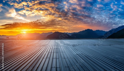 A large flat roof with a backdrop of sunset and mountains , generated by AI photo