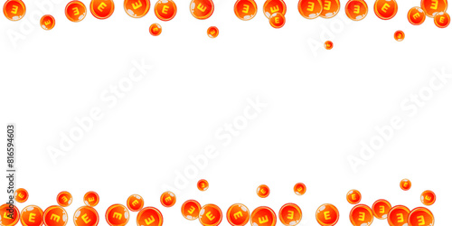 Vitamin E round capsules scattered randomly.