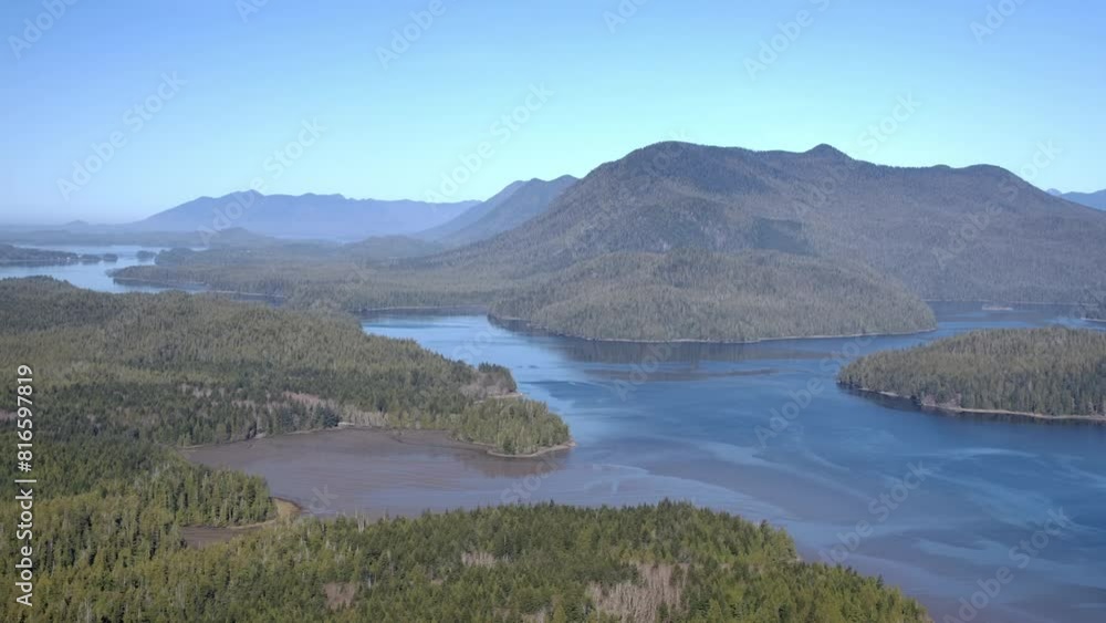 Beautiful Lush Green Mountains and Scattered Lakes - Sunny Aerial View Beautiful Lush Green Mountains and Scattered Lakes - Sunny Aerial View