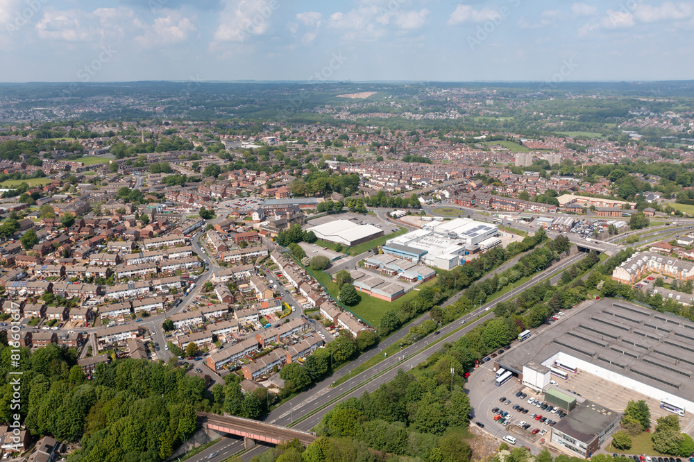 Aerial drone photo of the town of Bramley which is a district in west Leeds, West Yorkshire, England UK, showing residential housing estates and semi detached houses in the summer time Aerial drone photo of the town of Bramley which is a district in west Leeds, West Yorkshire, England UK, showing residential housing estates and semi detached houses in the summer time