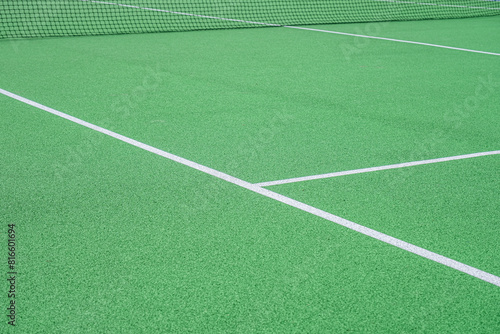 Part of the synthetic grass tennis court with markup